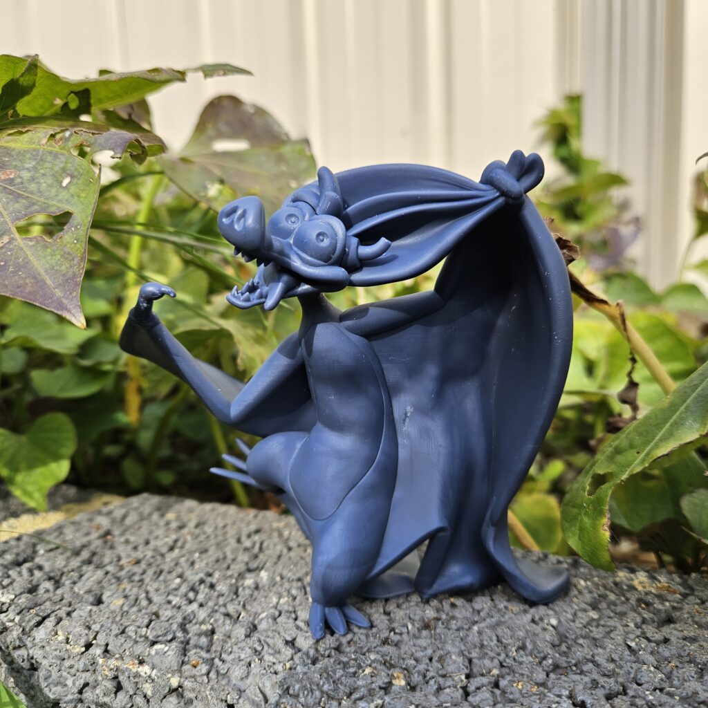 3d printed batty koda from Fern Gully, voiced by Robin Williams. Printed in Siraya Tech navy grey resin.